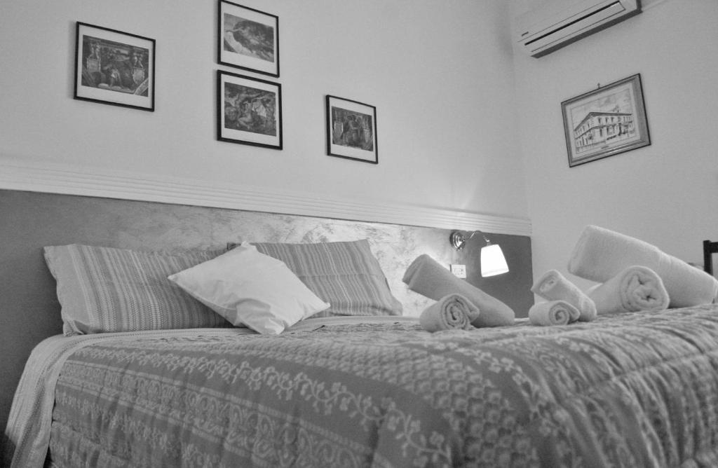 Postel nebo postele na pokoji v ubytování B&B Melibleo