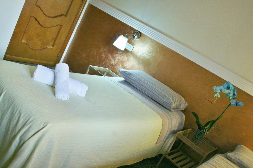 Postel nebo postele na pokoji v ubytování B&B Melibleo