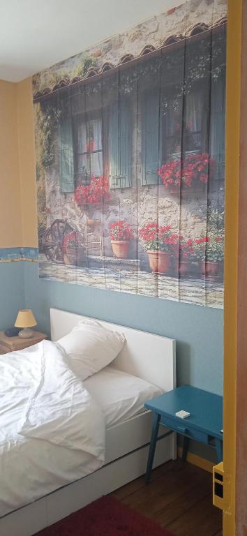 Postel nebo postele na pokoji v ubytování Chambre à la campagne ,au Soleil levant