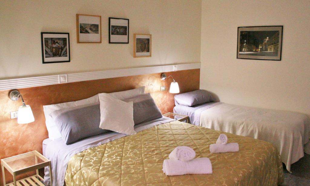 Postel nebo postele na pokoji v ubytování B&B Melibleo