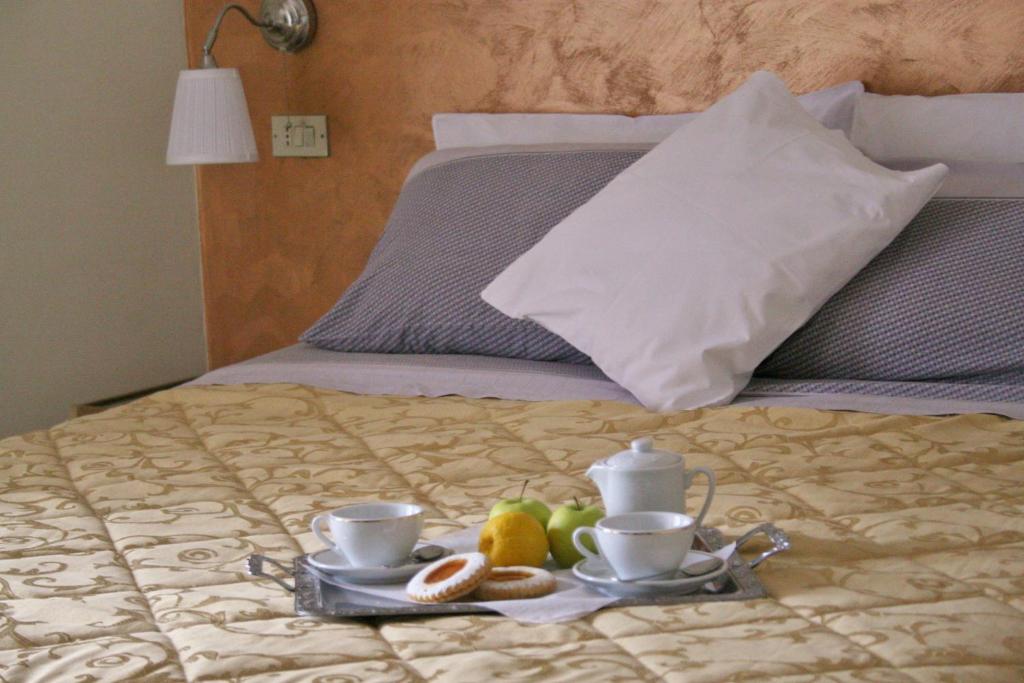 Postel nebo postele na pokoji v ubytování B&B Melibleo