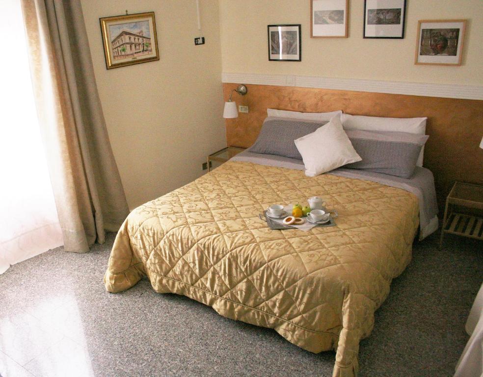 Postel nebo postele na pokoji v ubytování B&B Melibleo