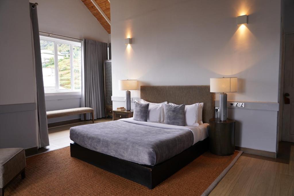 Postel nebo postele na pokoji v ubytování W15 Glenfall Nuwara Eliya