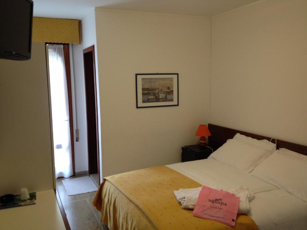 Кровать или кровати в номере Hotel Nevada