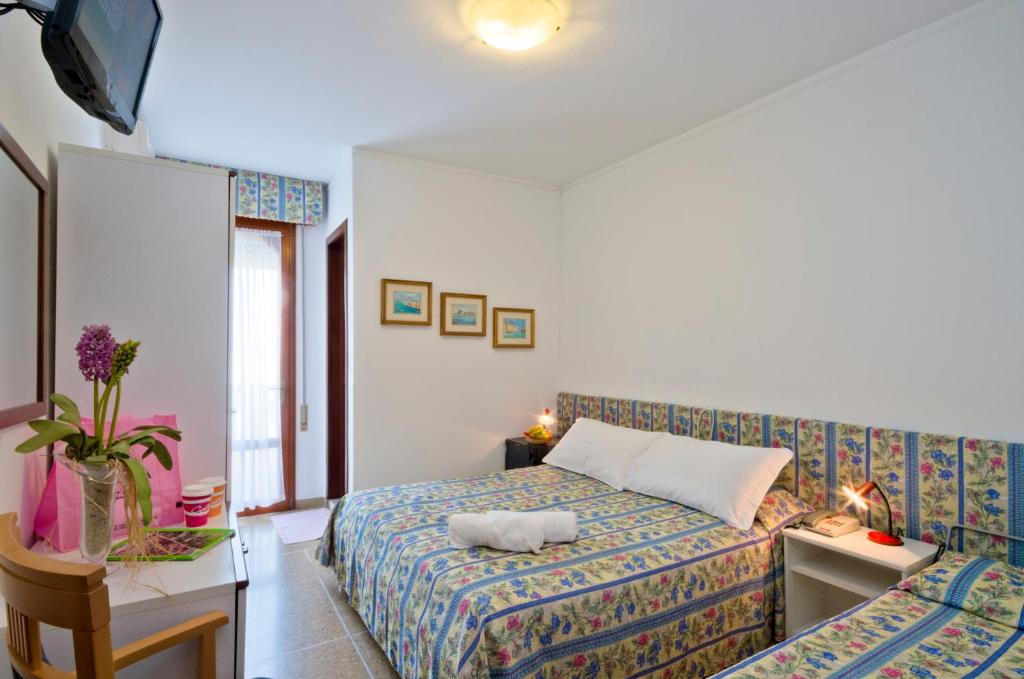 Кровать или кровати в номере Hotel Nevada