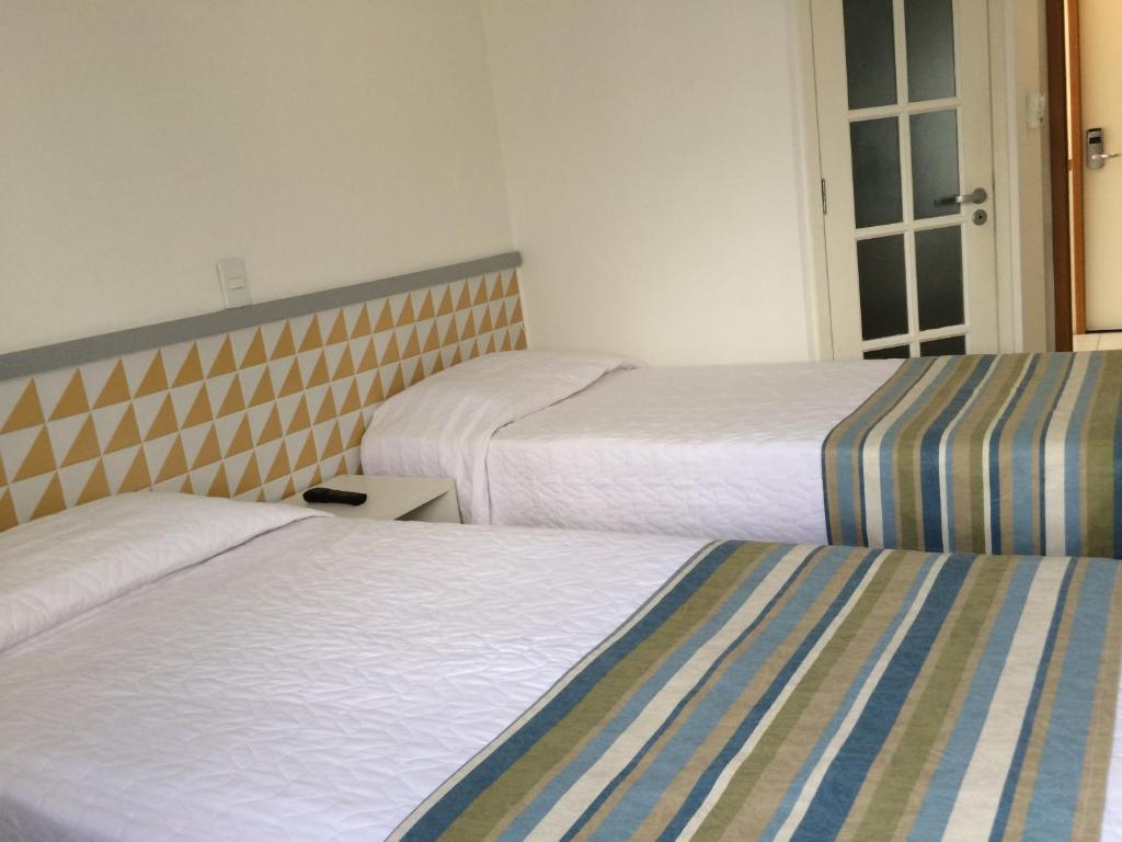 Postel nebo postele na pokoji v ubytování Ibis Budget Salvador