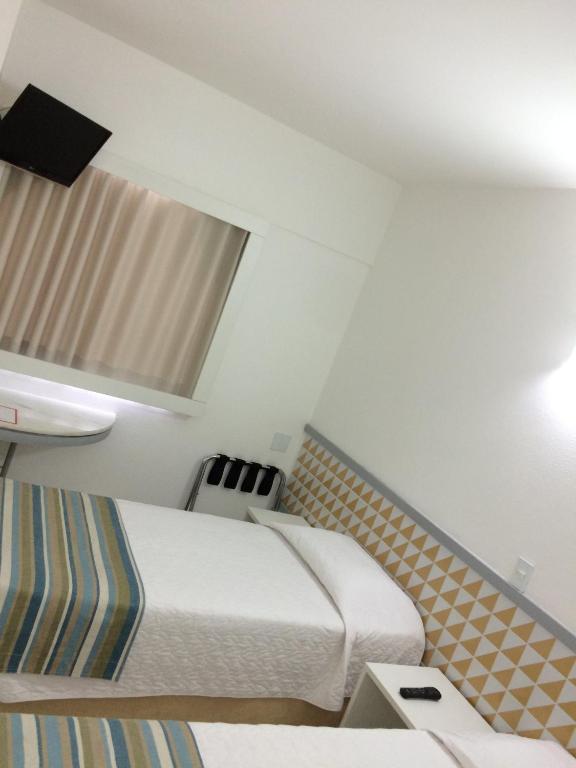 Postel nebo postele na pokoji v ubytování Ibis Budget Salvador