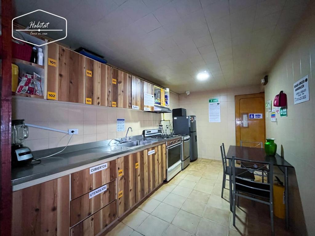 Kuchyň nebo kuchyňský kout v ubytování Hotel Habitat Hospedaje