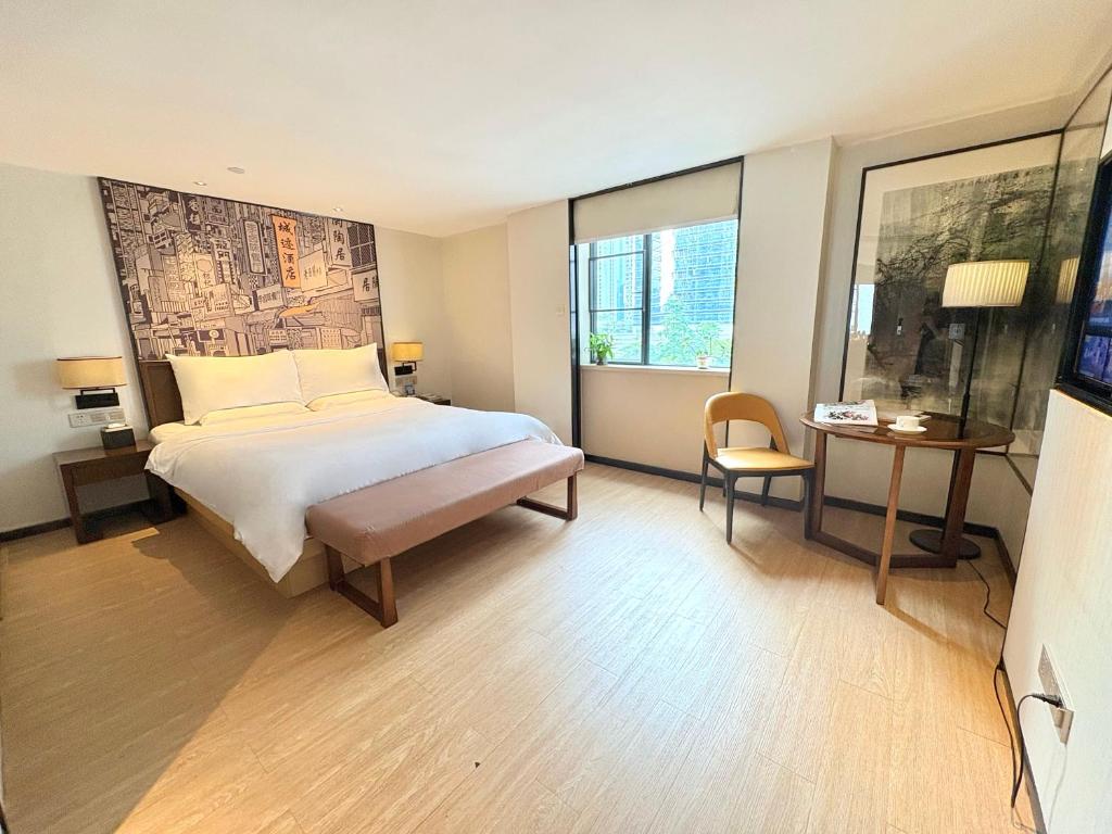Postel nebo postele na pokoji v ubytování Guangzhou City Join Hotel Shipai Qiao metro Branch