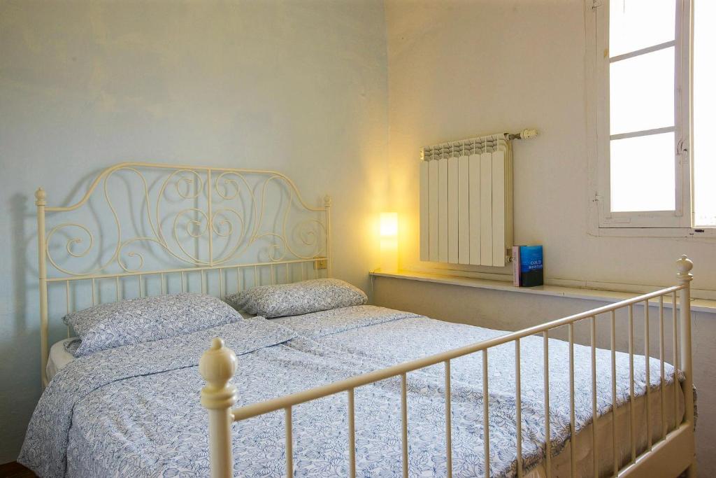 Postel nebo postele na pokoji v ubytování Appartamento Ronco