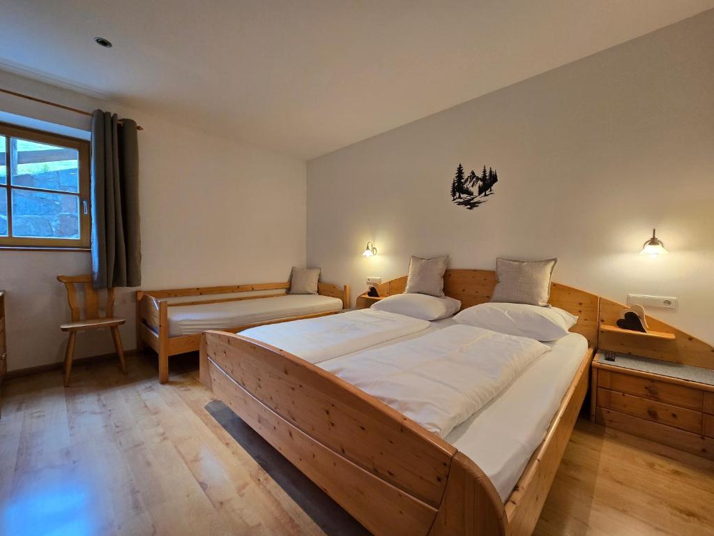Postel nebo postele na pokoji v ubytování Martscholer Weinhof