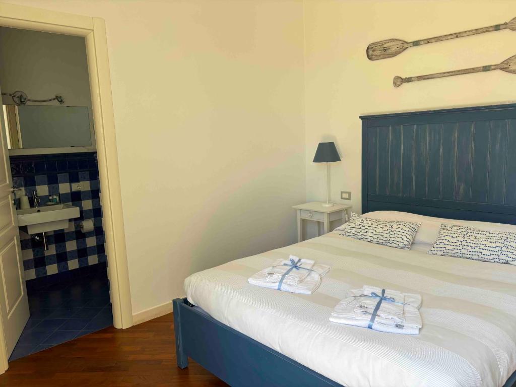 Postel nebo postele na pokoji v ubytování Affittacamere Villa Silvia