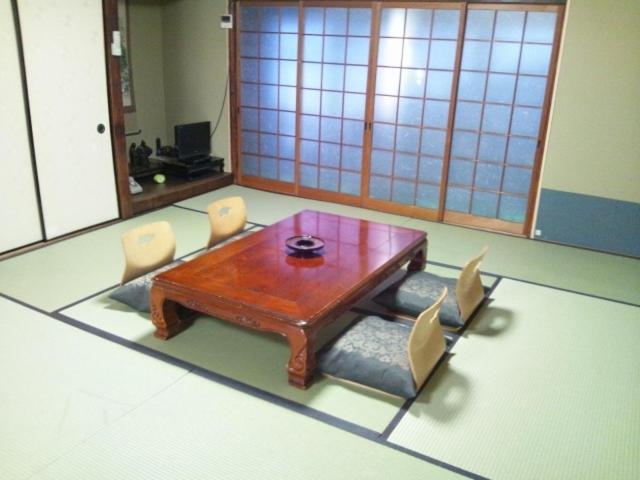 Posezení v ubytování Takigawa Ryokan