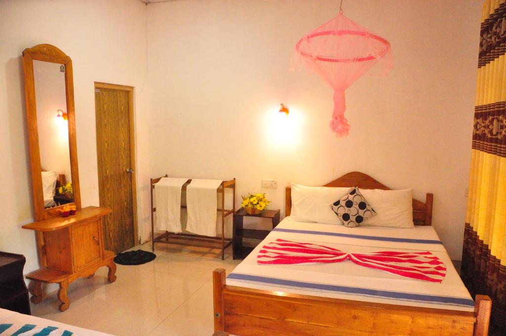 Postel nebo postele na pokoji v ubytování Horizon Resort & Hostel Sigiriya