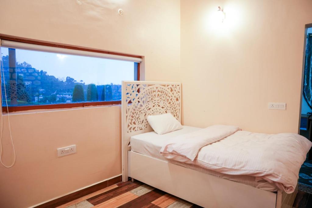 Postel nebo postele na pokoji v ubytování Monal Meadows