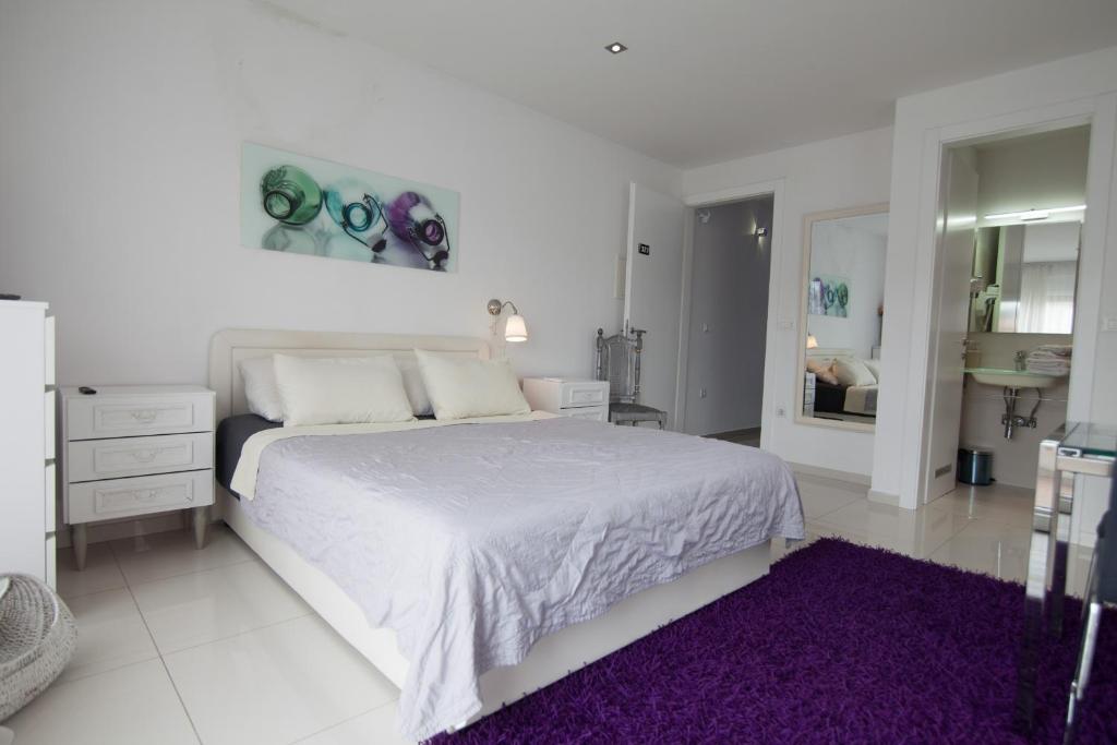 Ein Bett oder Betten in einem Zimmer der Unterkunft Basic Mansion Mandalina