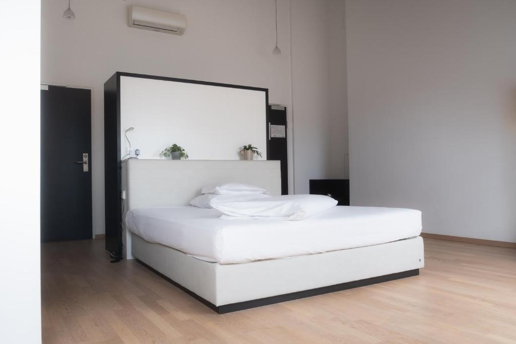 Postel nebo postele na pokoji v ubytování City-Hotel