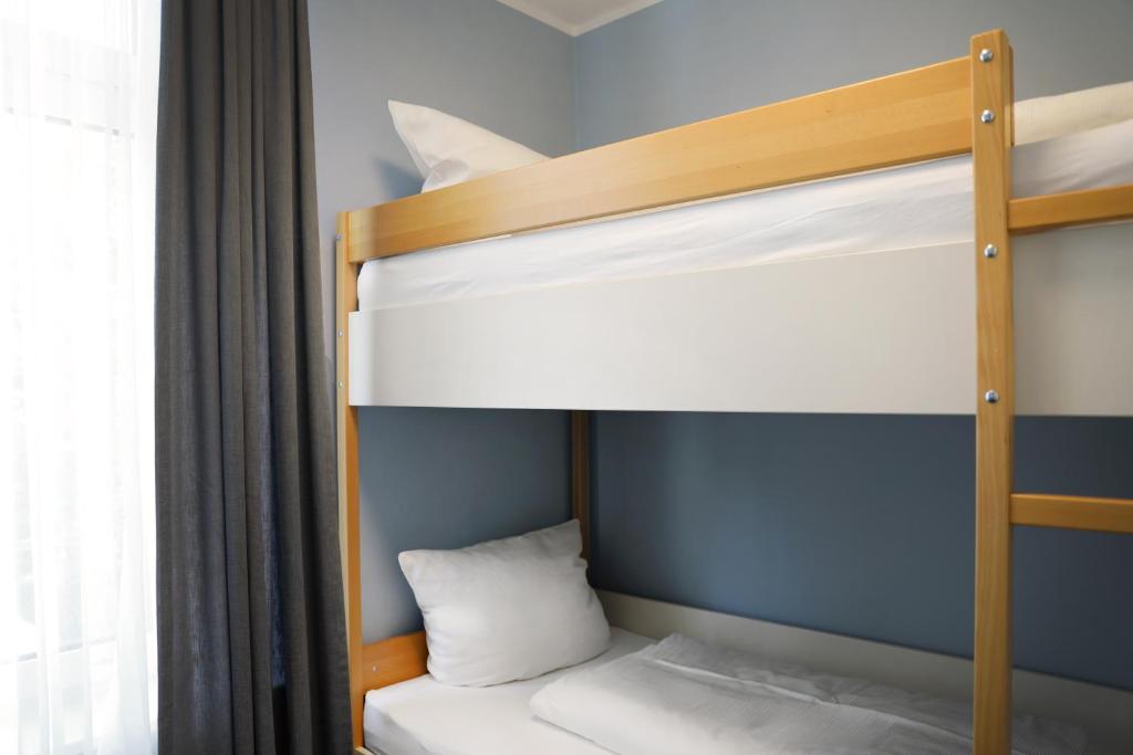 Letto o letti in una camera di Michels Haus Wilhelm-Augusta