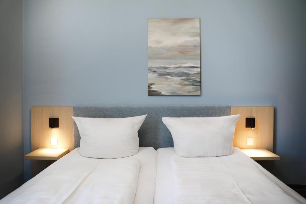 Letto o letti in una camera di Michels Haus Wilhelm-Augusta