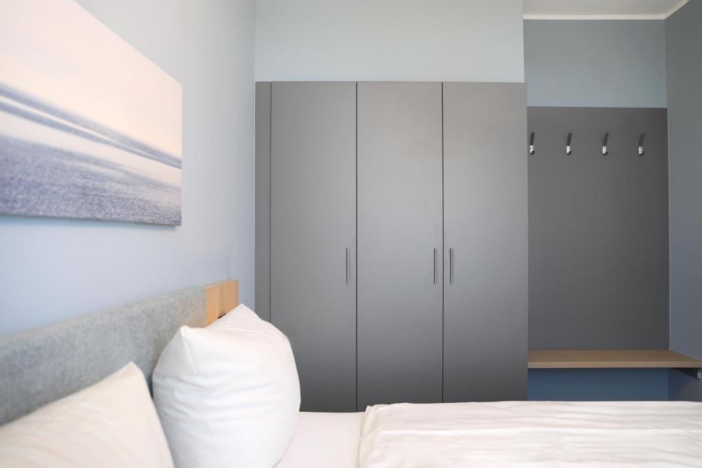 Letto o letti in una camera di Michels Haus Wilhelm-Augusta
