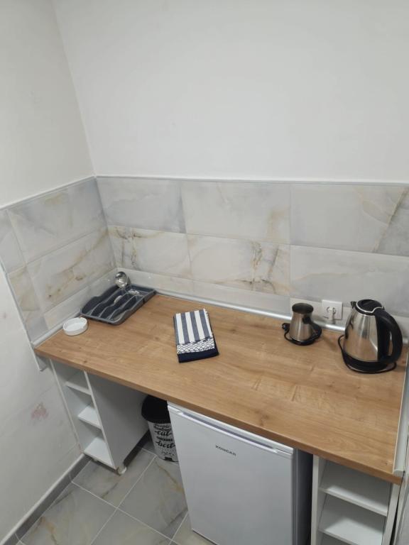 Kuchyň nebo kuchyňský kout v ubytování Apartman Jorgic