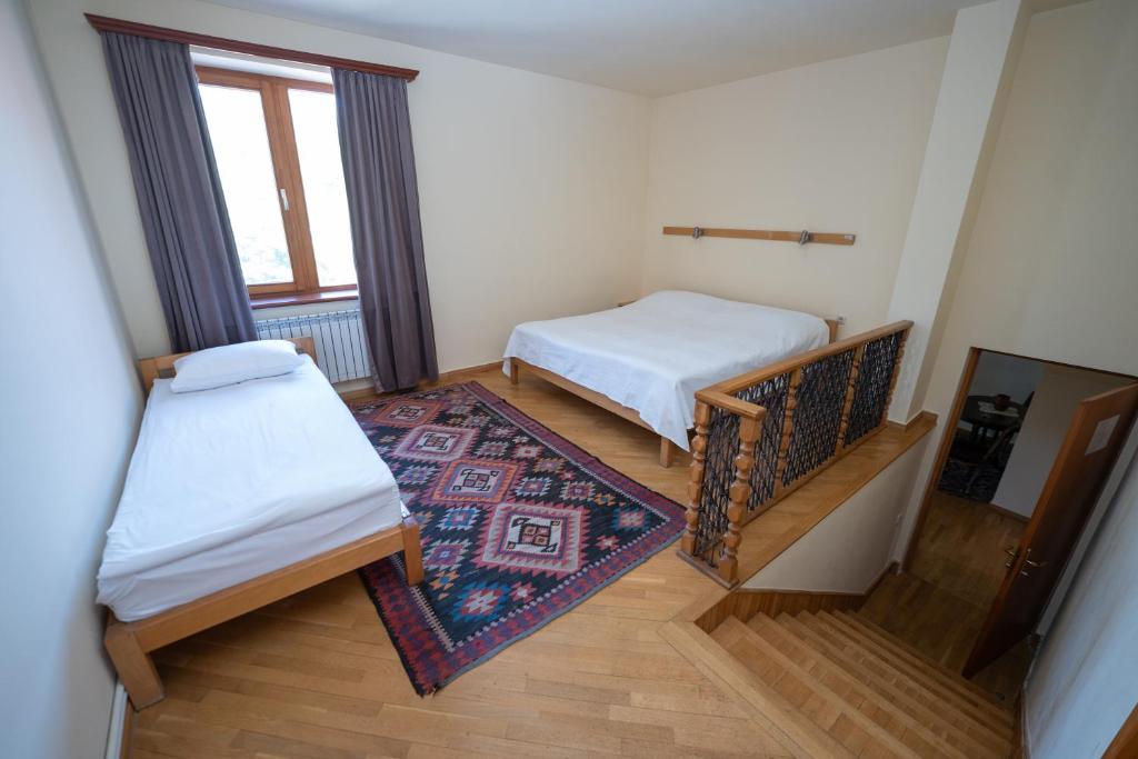 Postel nebo postele na pokoji v ubytování Hotel Mirhav