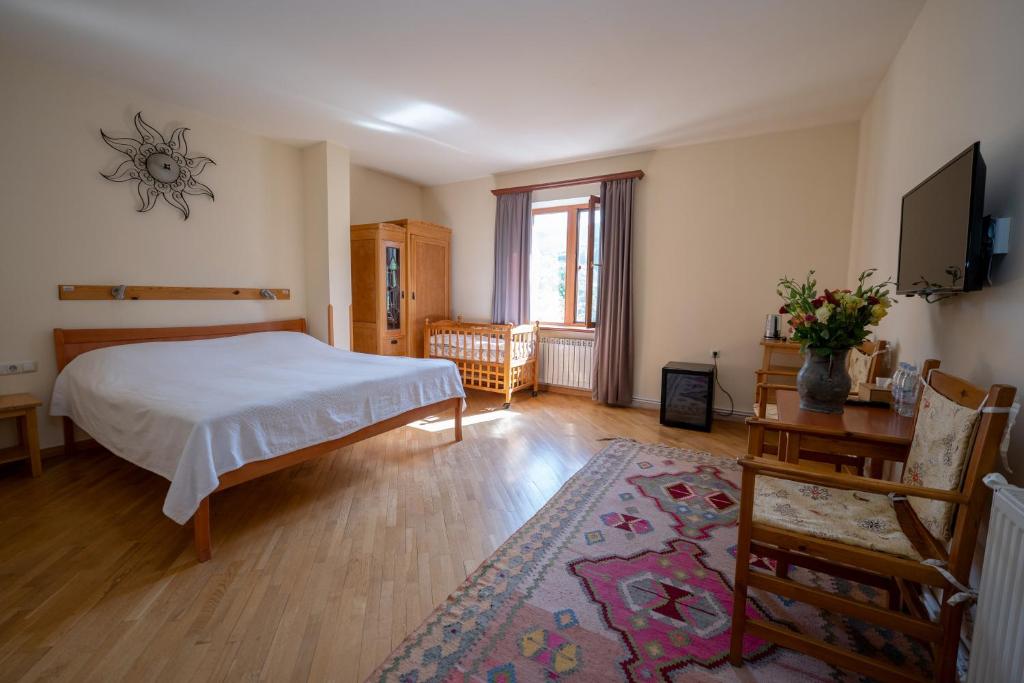 Postel nebo postele na pokoji v ubytování Hotel Mirhav