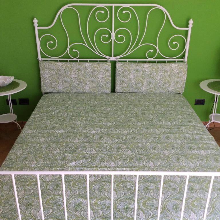 Letto o letti in una camera di B&B in Residence "...a due passi dalla Scala dei Turchi"