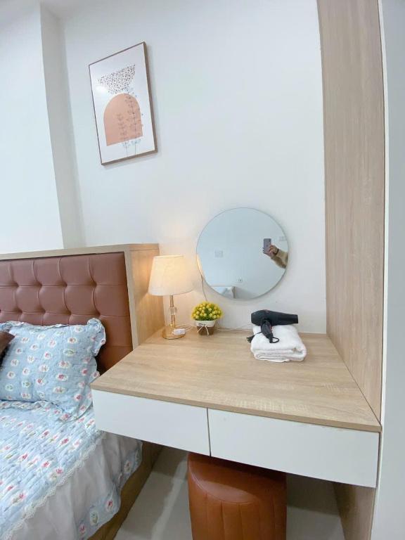 Postel nebo postele na pokoji v ubytování Minh Anh Villa & Apartment