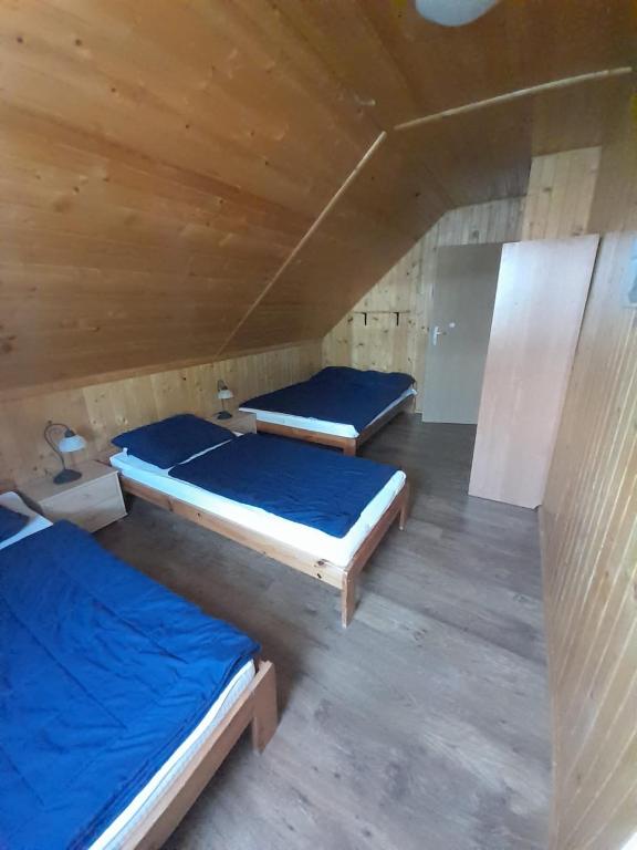 Postel nebo postele na pokoji v ubytování Domki DUET