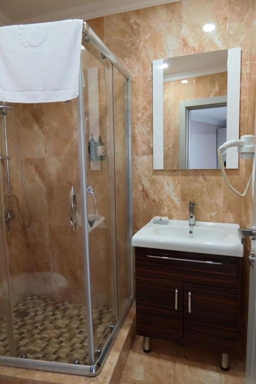 Koupelna v ubytování Era Palace Gonio