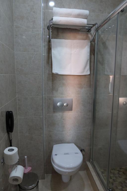 Koupelna v ubytování Era Palace Gonio
