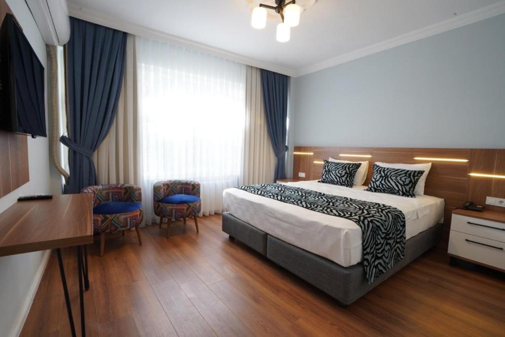 Postel nebo postele na pokoji v ubytování My Suite House