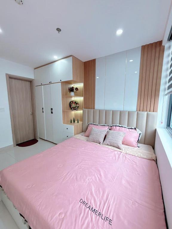 Postel nebo postele na pokoji v ubytování Minh Anh Villa & Apartment