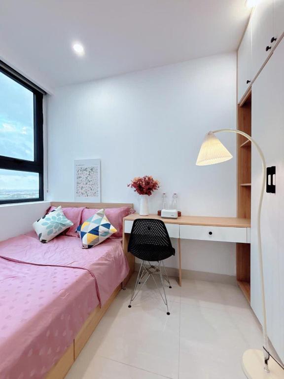 Postel nebo postele na pokoji v ubytování Minh Anh Villa & Apartment