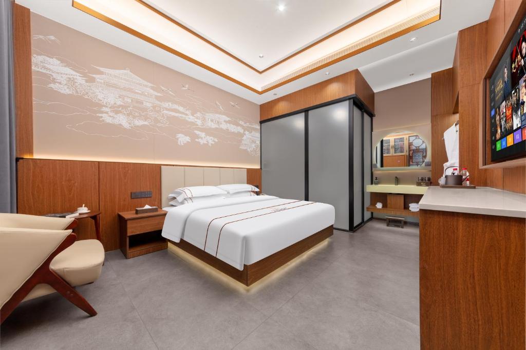 TV a/nebo společenská místnost v ubytování Xingshengjiu Courtyard Hotel Pingyao