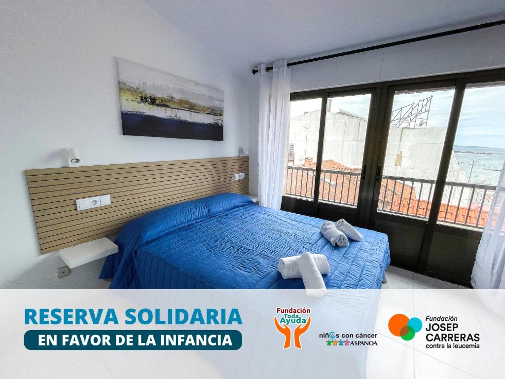 Cama o camas de una habitación en Complejo Tamanaco Illa de Arousa 3000