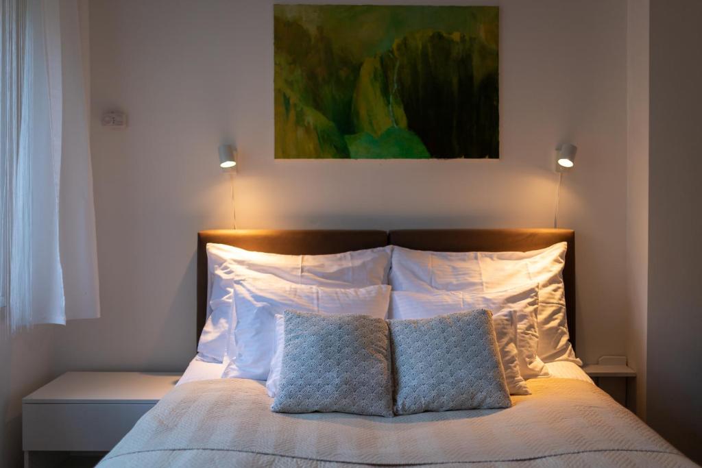 Posteľ alebo postele v izbe v ubytovaní Sunbird Apartman Budapest
