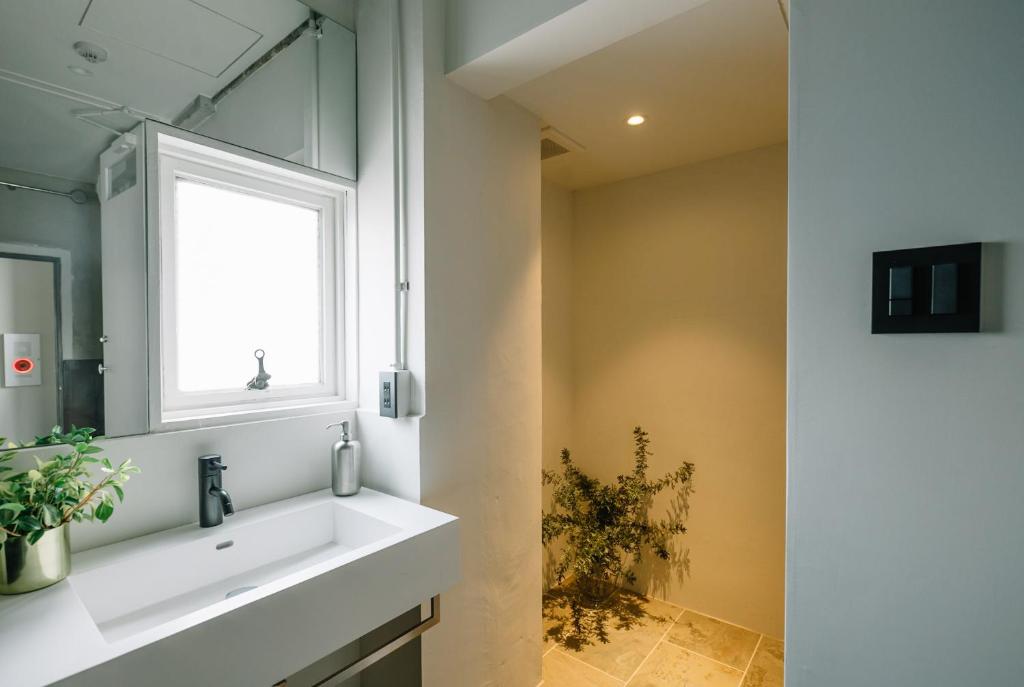 Koupelna v ubytování HOTEL Inc