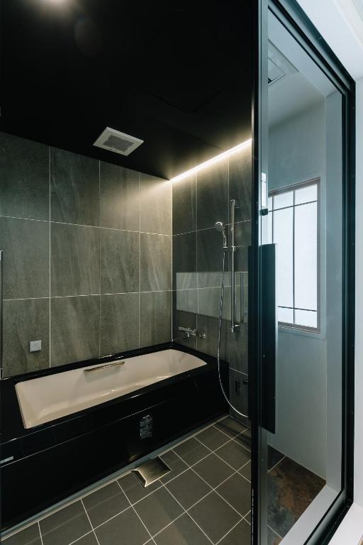 Koupelna v ubytování HOTEL Inc