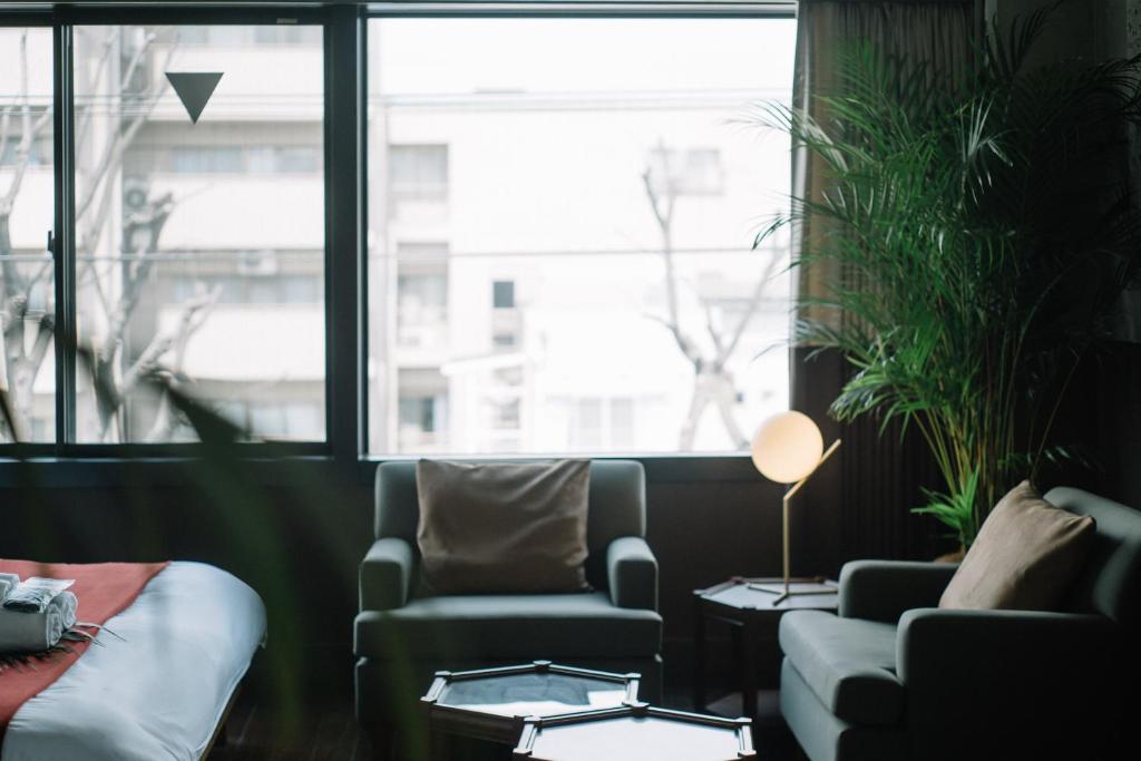 Posezení v ubytování HOTEL Inc
