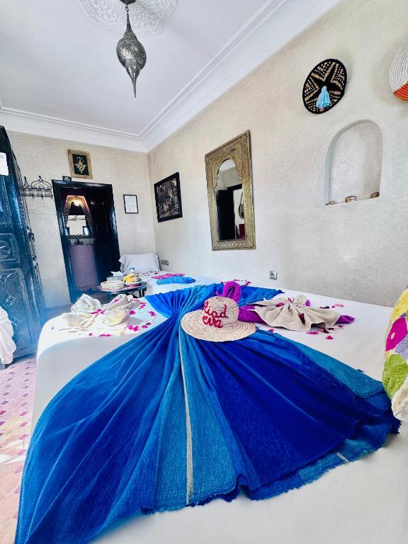 Postel nebo postele na pokoji v ubytování Riad Eva