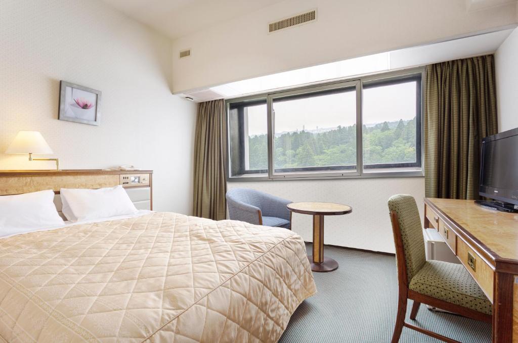 Postel nebo postele na pokoji v ubytování Art Hotel Narita