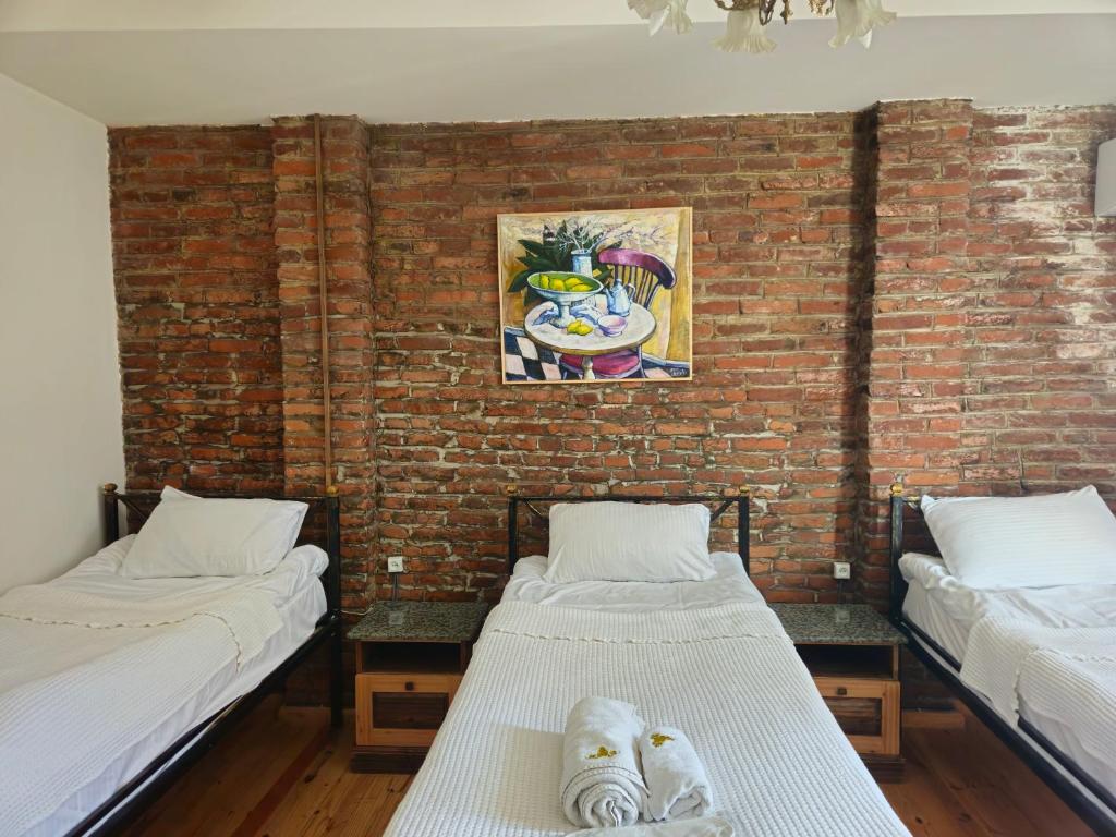 Postel nebo postele na pokoji v ubytování Boutique Hotel Verdzi