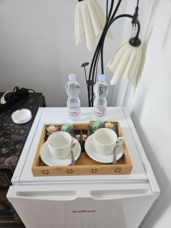Příslušenství pro přípravu čaje a kávy v ubytování Boutique Hotel Verdzi
