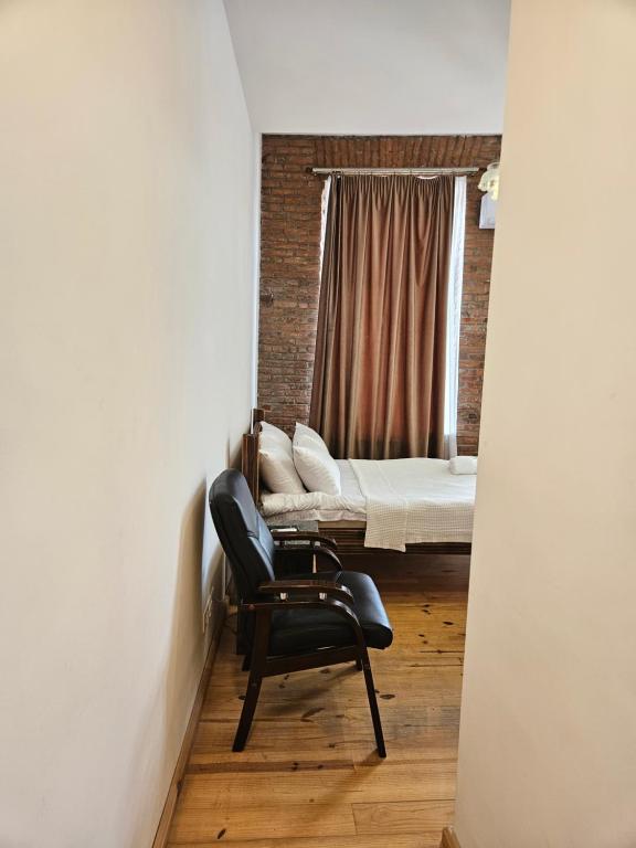 Postel nebo postele na pokoji v ubytování Boutique Hotel Verdzi