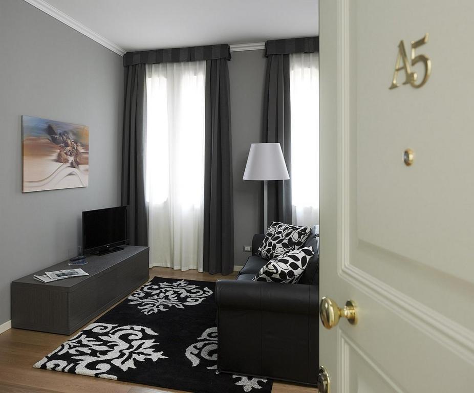 Postel nebo postele na pokoji v ubytování Palace Suite