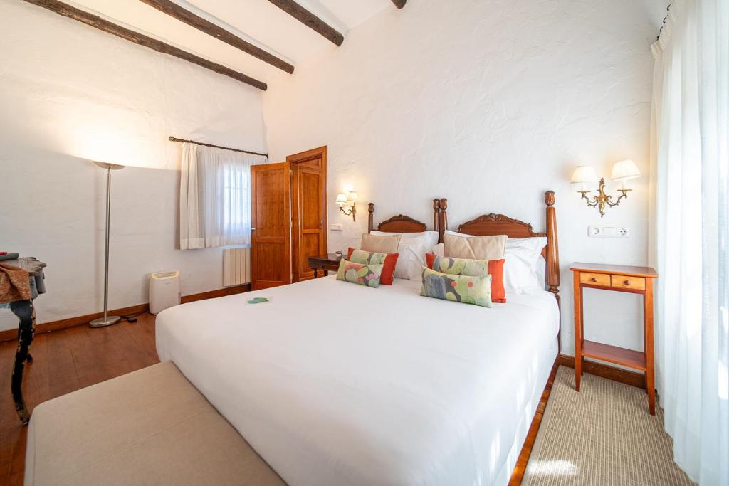 Postel nebo postele na pokoji v ubytování Caserio de Mozaga - Hotel Rural