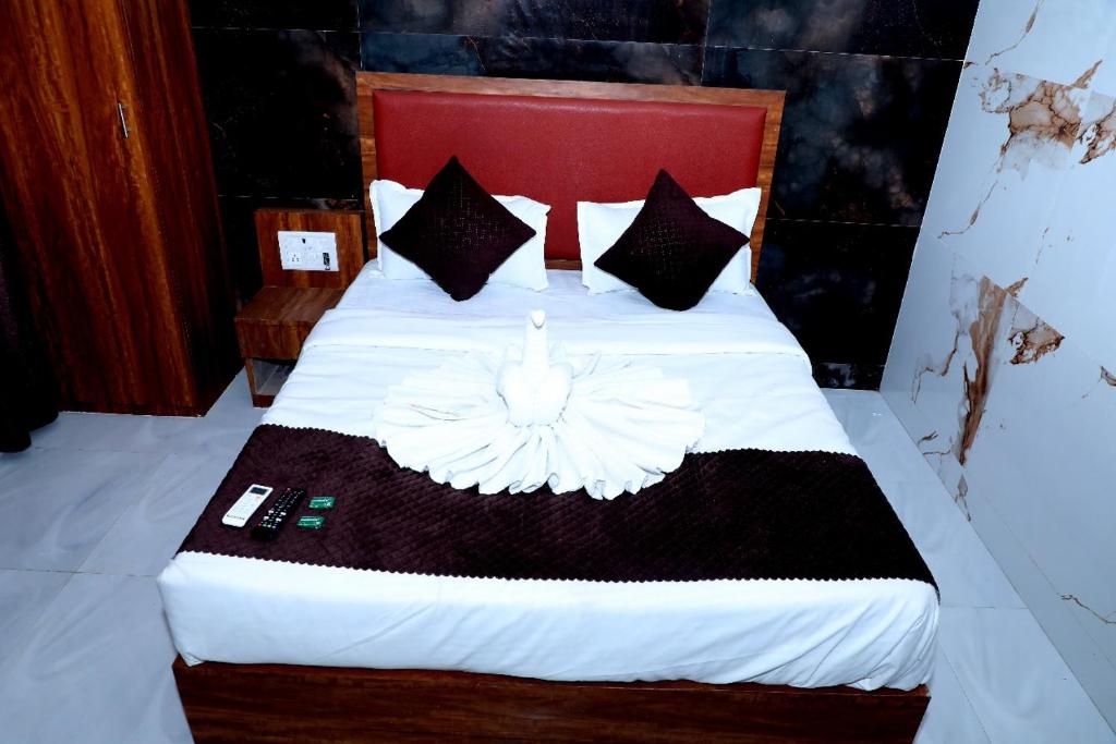 Katil atau katil-katil dalam bilik di Hotel Chirag Next