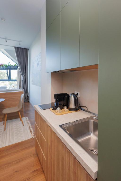 Köök või kööginurk majutusasutuses Moonlight Apartments Tirana